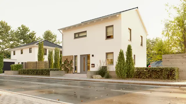Außenansicht des Stadthauses Flair 124 von Town & Country Haus: kubische Architektur mit großzügigen Fensterflächen und stilvoller Fassade, ideal für urbanes Wohnen